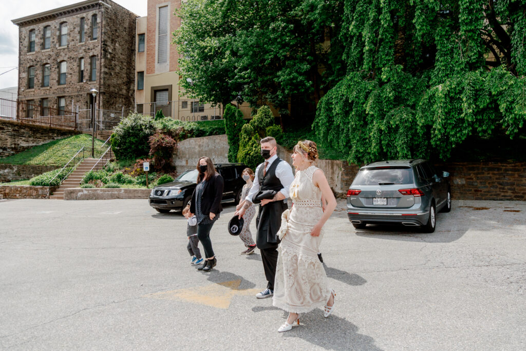 Bride arriving at the church on a spring day by Philadelphia wedding photographer Vay Photo