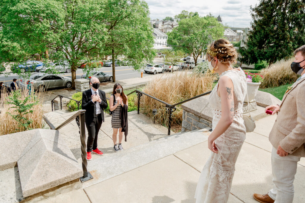 Wedding guests admiring the bride before a small church ceremony in Pennsylvania