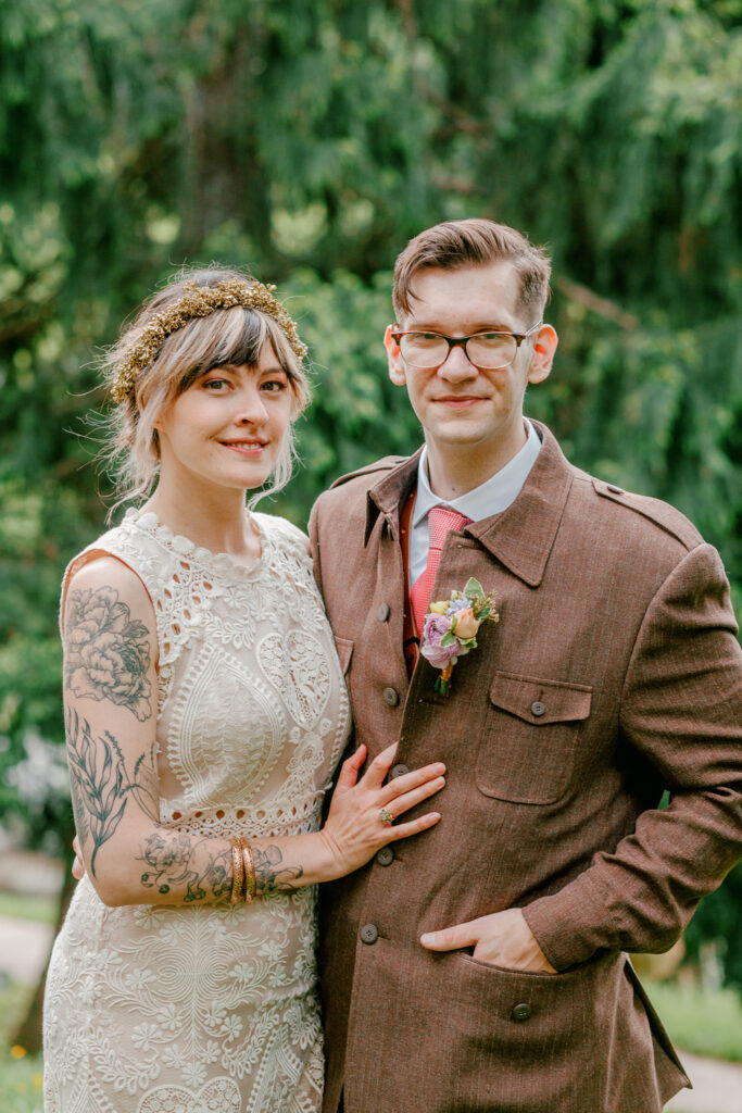 Bride and Groom smiling on their intimate spring wedding celebration by Vay Photo