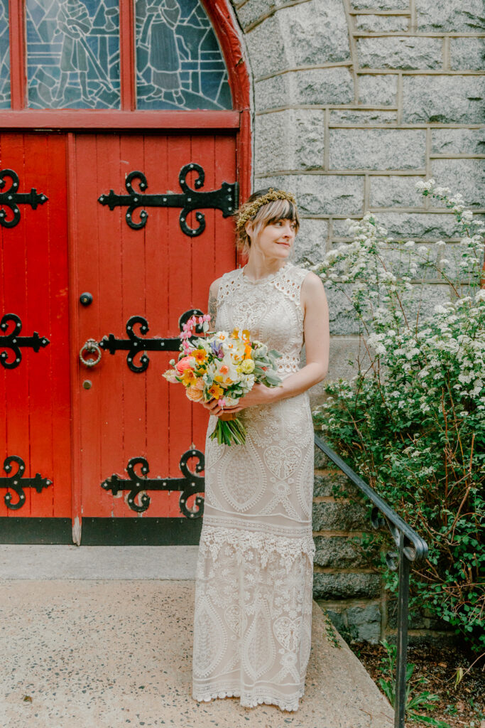 Spring bride outside a church in East Falls by Philadelphia wedding photographer Vay Photo